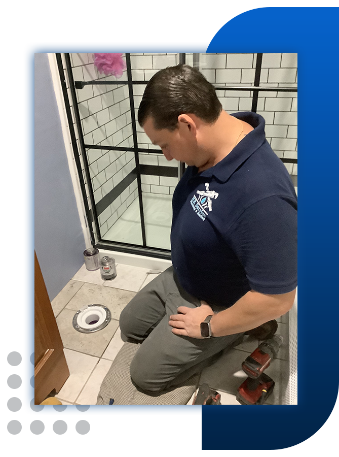 HB Service worker doing plumbing work